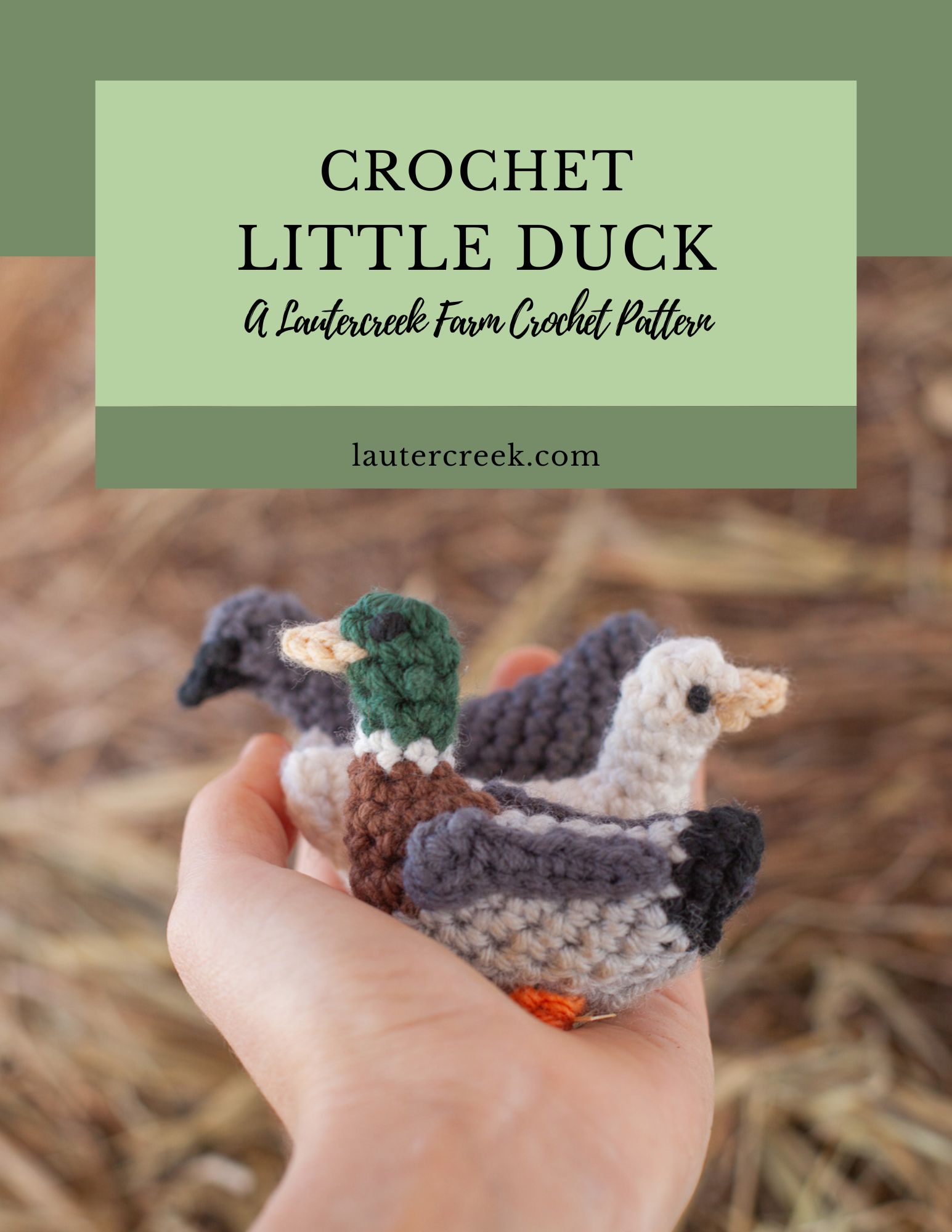 holding 3 ducks made with this little duck crochet pattern