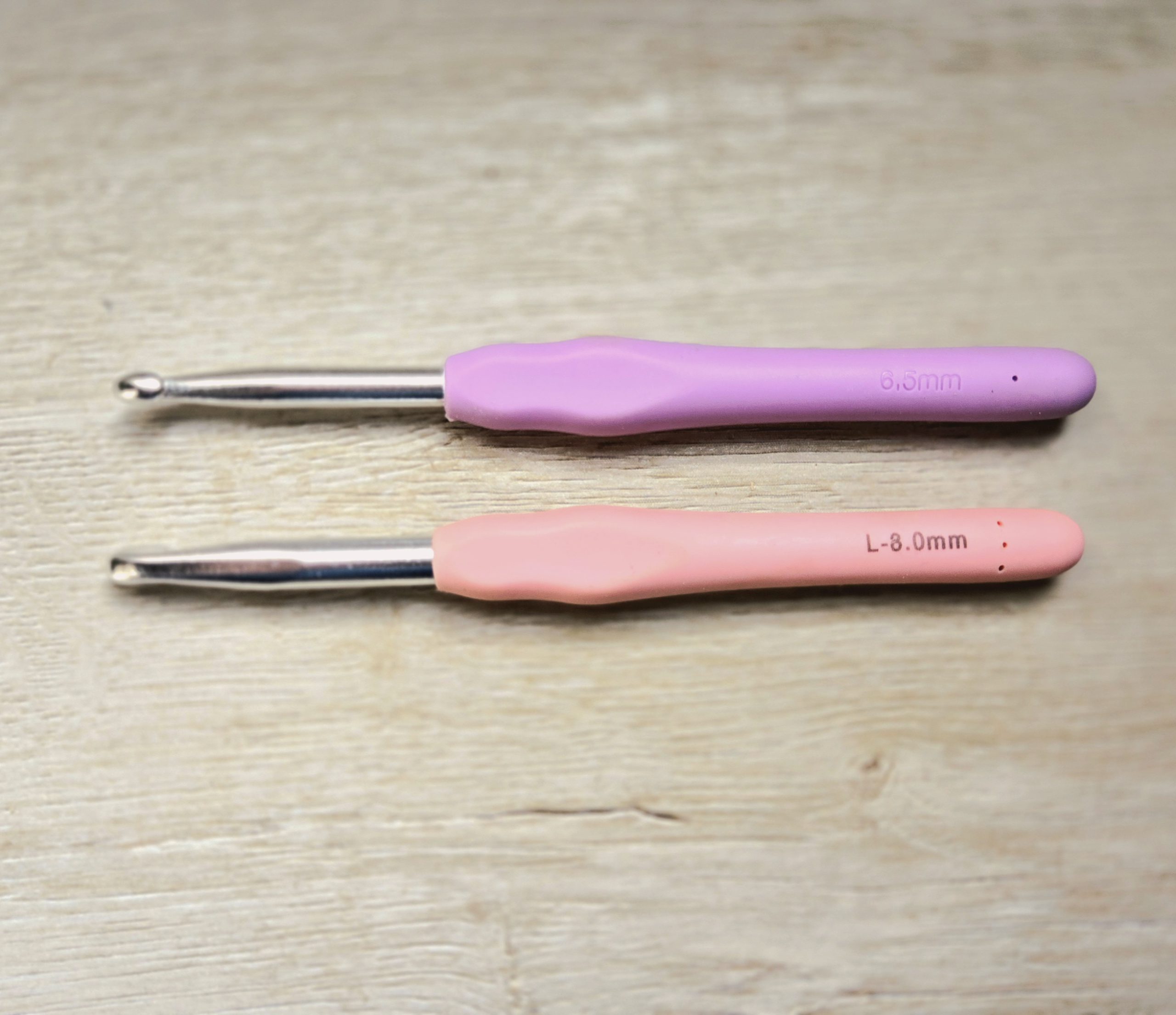 Two crochet hooks side-by-side.