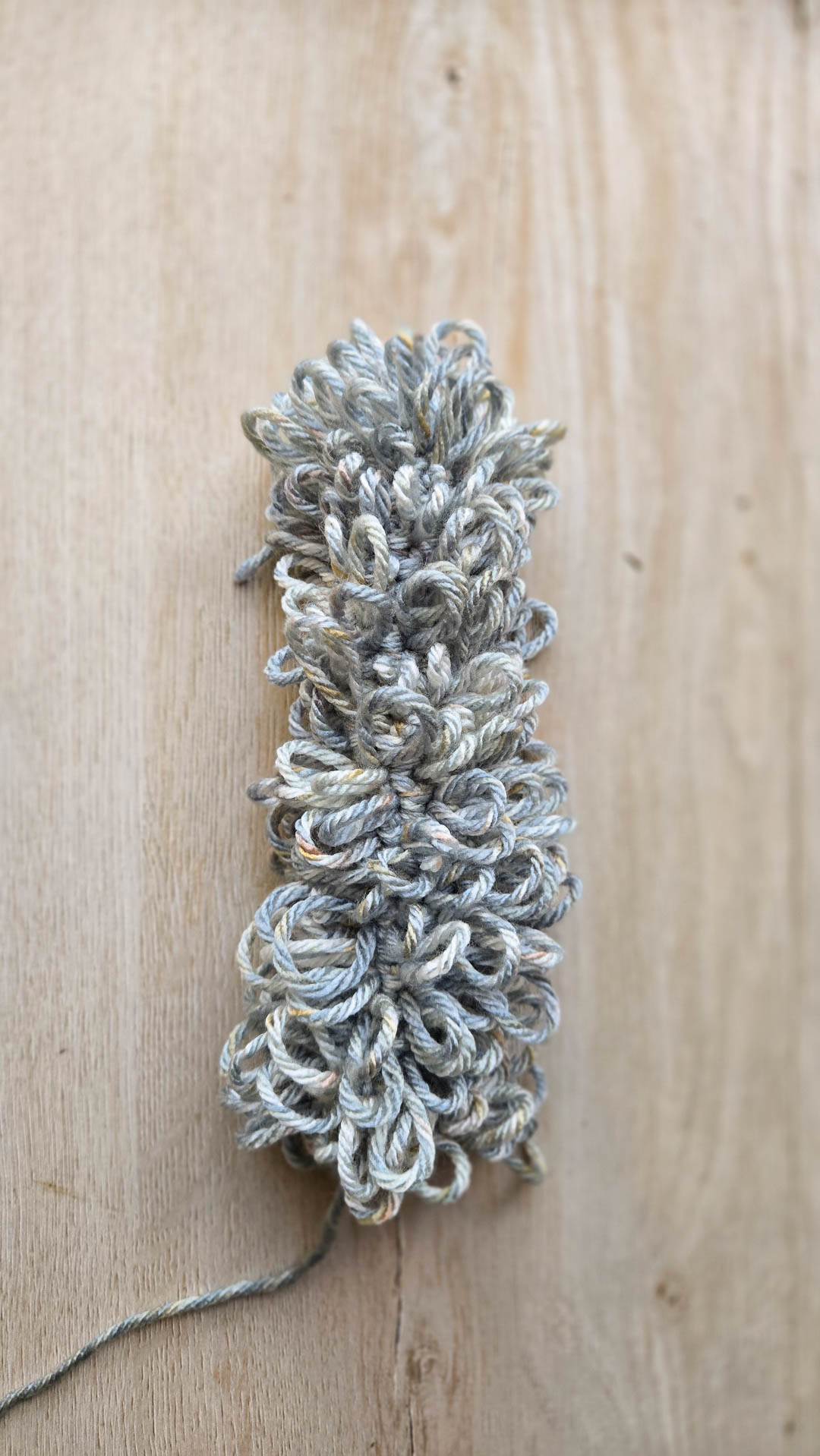a bushy squirrel tail made with lots of crochet loop stitches