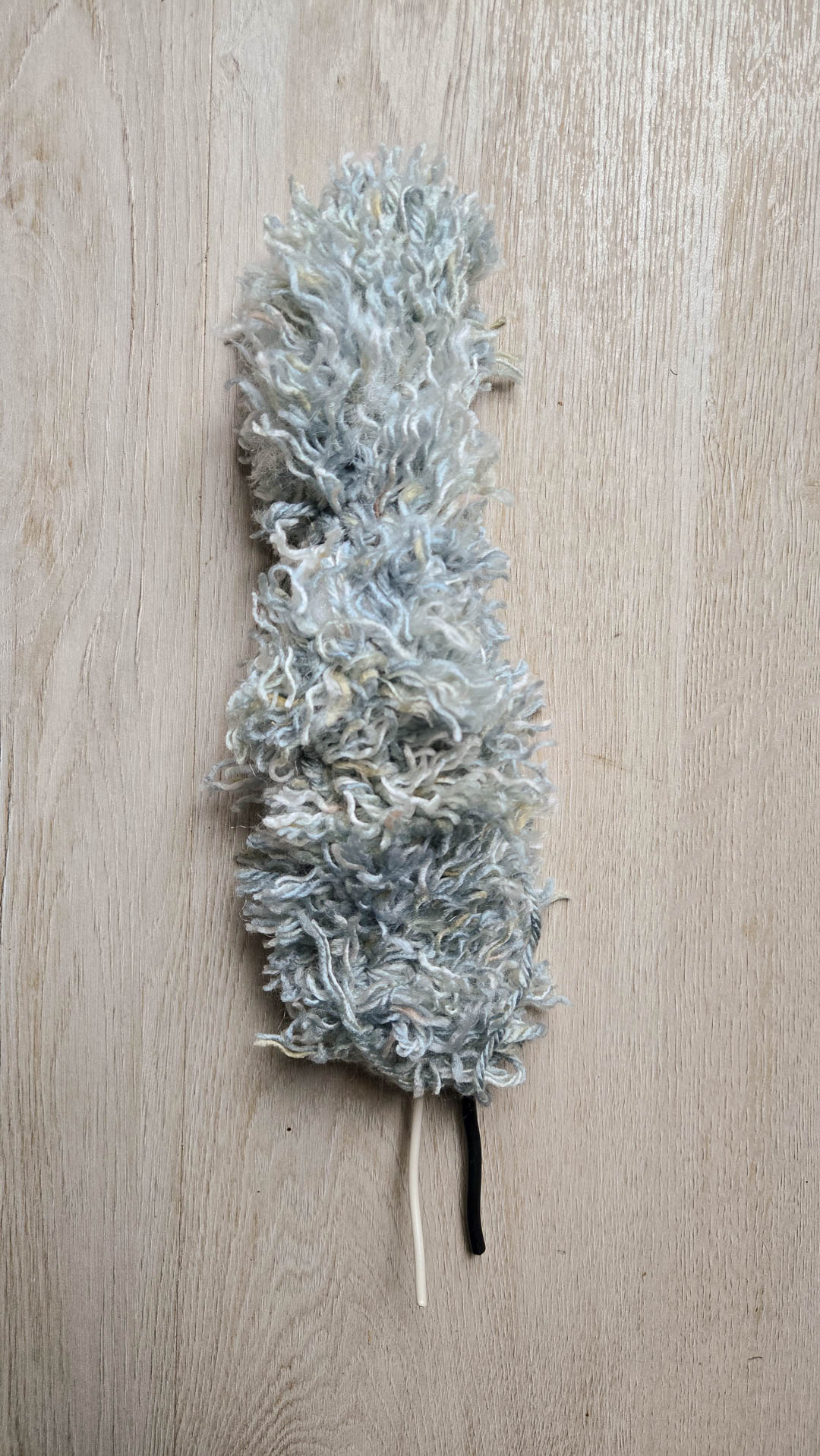 a bushy squirrel tail made with lots of crochet loop stitches