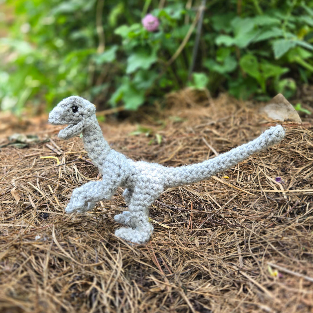 A side view of the crochet dinosaur.