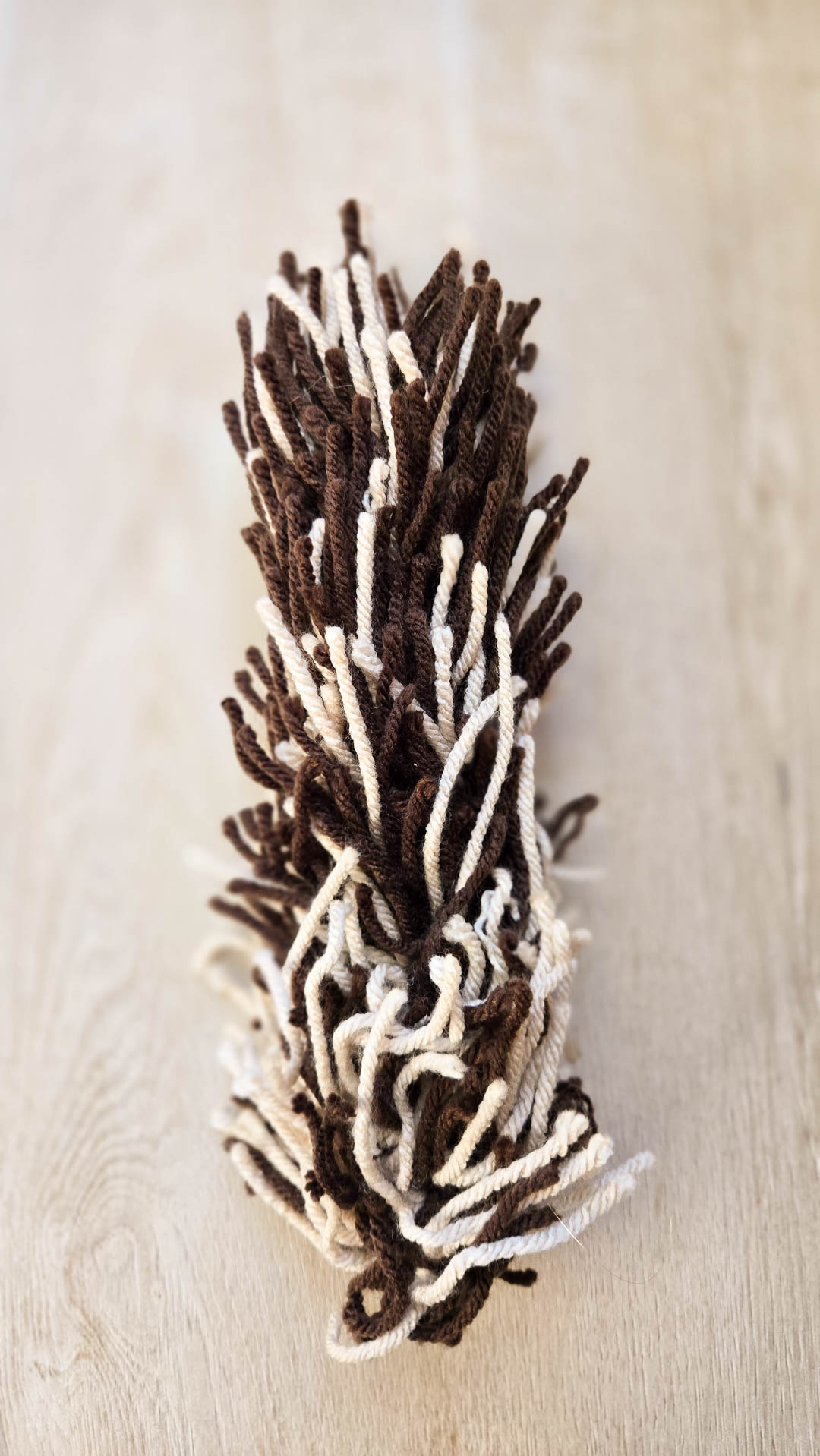 A crochet object entirely covered with crochet fur.