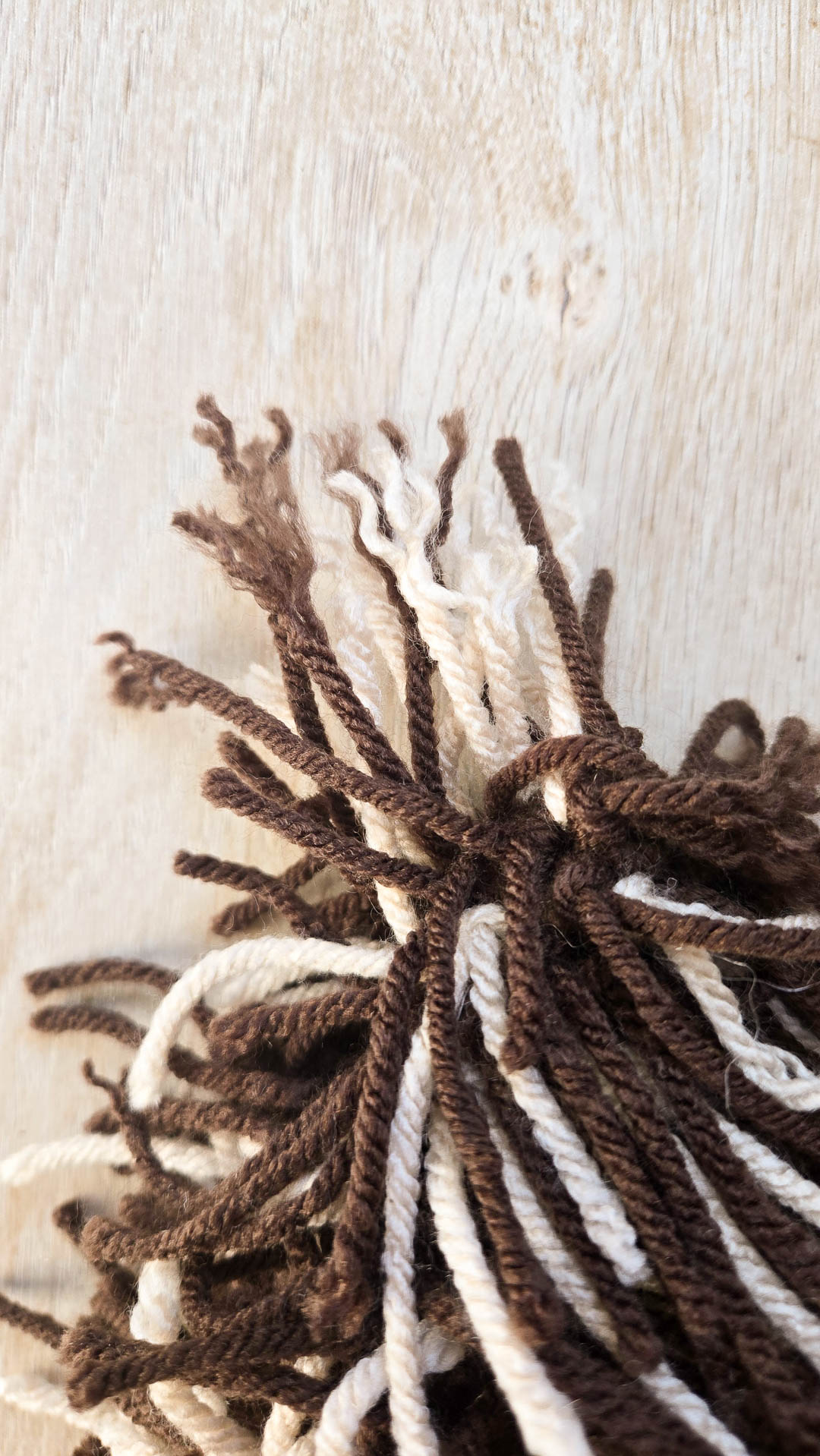 A cluster of threads with frayed ends, the first step in making crochet fur.